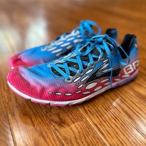 Brooks Mach 14 spiked magenta and teal running shoes